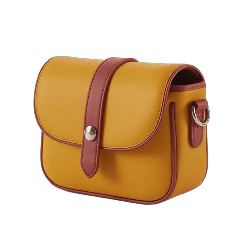 Mustard leather crossbody bag with burgundy trim isolated clipart for fashion design and branding PNG